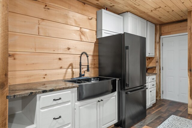2940 Beecarter Rd, Dandridge, TN 37725 - kitchen with a sink, white cabinets, freestanding refrigerator, and wooden ceiling