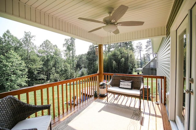 1161 Wooddale Rd, Morristown, TN 37814 - wooden deck with ceiling fan and view of scattered trees