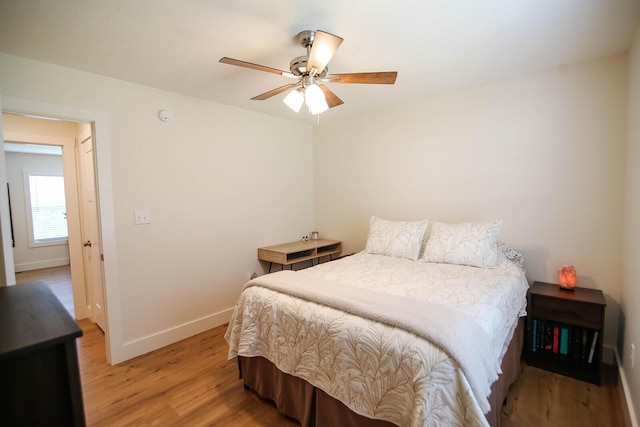 1161 Wooddale Rd, Morristown, TN 37814 - bedroom with light wood-style floors, baseboards, and a ceiling fan