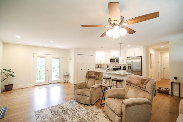 1161 Wooddale Rd, Morristown, TN 37814 - living area with recessed lighting, baseboards, light wood-style flooring, and a ceiling fan