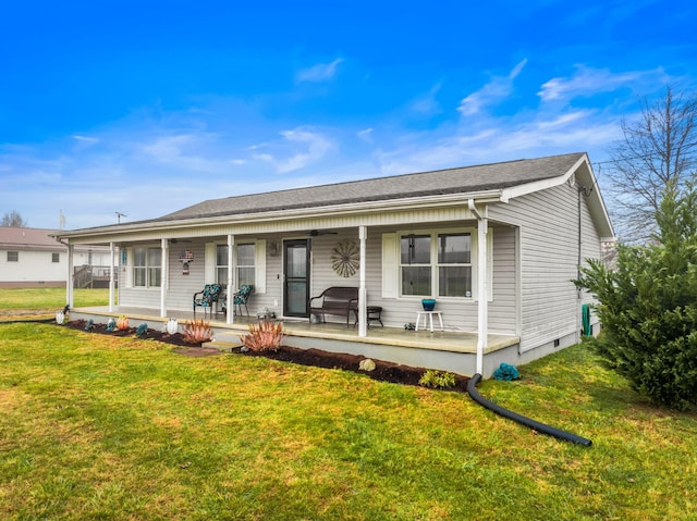 view of front of home featuring a front lawn and covered porch