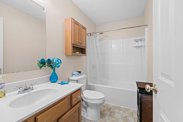 full bathroom featuring a textured ceiling, vanity, shower / bath combo, and toilet