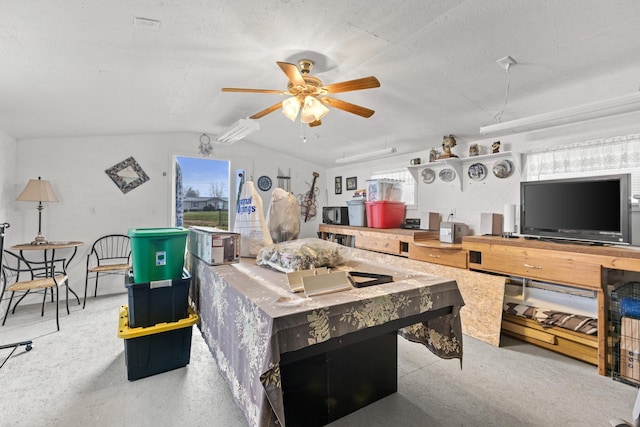 rec room featuring vaulted ceiling and ceiling fan