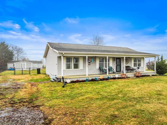 view of front of property with a front yard and a porch