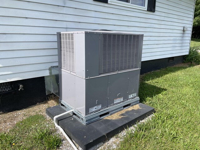exterior view of crawl space and cooling unit