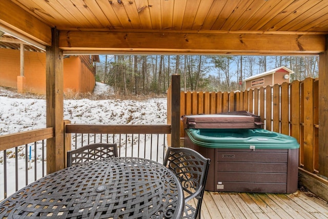 view of snow covered deck