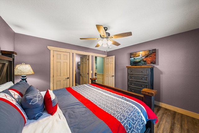 bedroom featuring dark hardwood / wood-style floors and ceiling fan