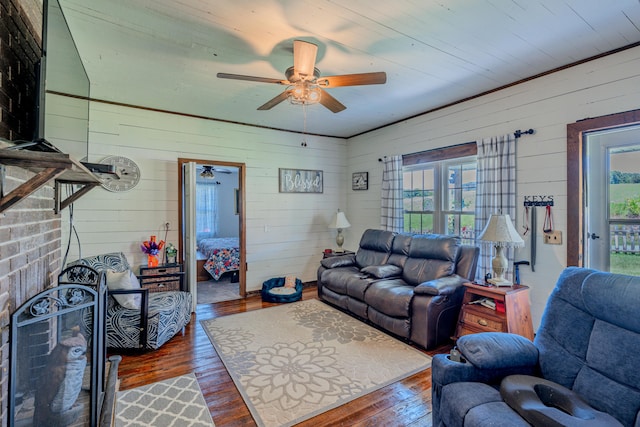 625 Trentham Hollow Rd, Parrottsville, TN 37843 - living area featuring a ceiling fan, hardwood / wood-style flooring, and wooden walls