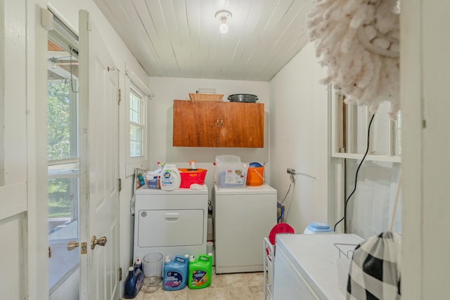 625 Trentham Hollow Rd, Parrottsville, TN 37843 - washroom with cabinet space, washer and clothes dryer, and light tile patterned floors