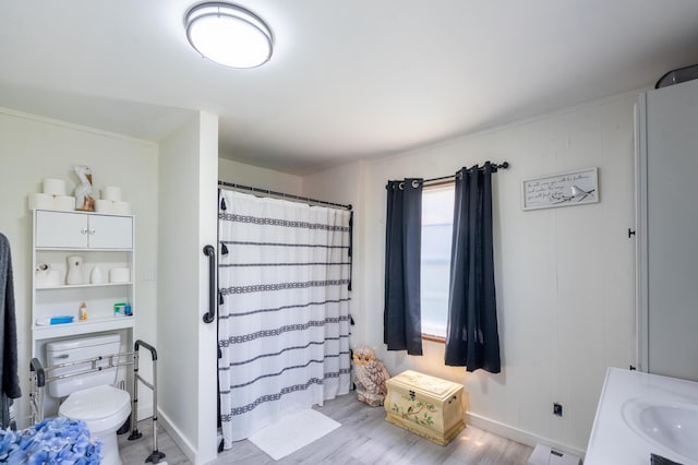 625 Trentham Hollow Rd, Parrottsville, TN 37843 - full bathroom featuring wood finished floors, a shower with shower curtain, vanity, and a baseboard radiator