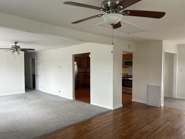 2151 Thomas Dr, Morristown, TN 37814 - empty room featuring attic access, ceiling fan, and wood finished floors