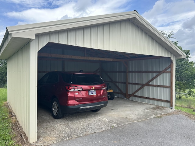 2151 Thomas Dr, Morristown, TN 37814 - garage featuring a detached carport