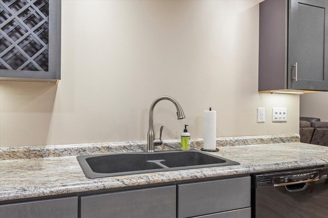 419 Colonial St, Jefferson City, TN 37760 - kitchen with black dishwasher, gray cabinets, a sink, and light stone counters