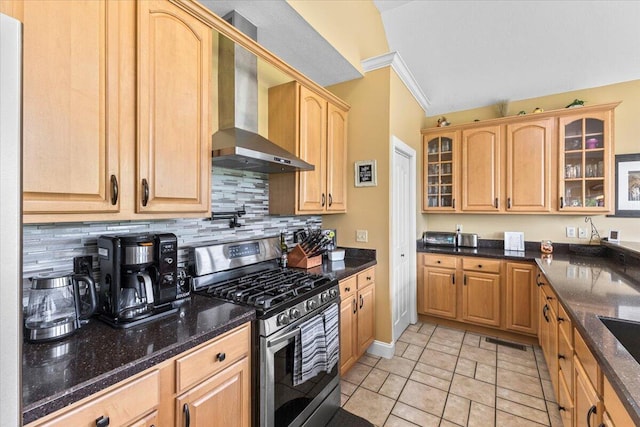 419 Colonial St, Jefferson City, TN 37760 - kitchen with stainless steel gas stove, wall chimney range hood, tasteful backsplash, glass insert cabinets, and dark stone counters