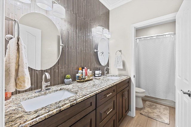 419 Colonial St, Jefferson City, TN 37760 - bathroom with toilet, decorative backsplash, wood finished floors, double vanity, and ornamental molding