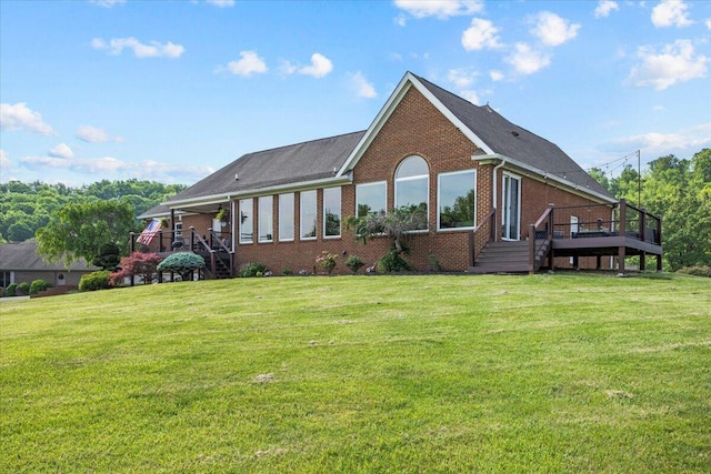 419 Colonial St, Jefferson City, TN 37760 - rear view of house featuring brick siding, a deck, a yard, and stairs