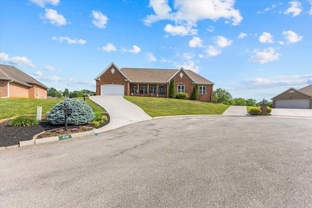 419 Colonial St, Jefferson City, TN 37760 - ranch-style house featuring a front yard, driveway, brick siding, and a garage