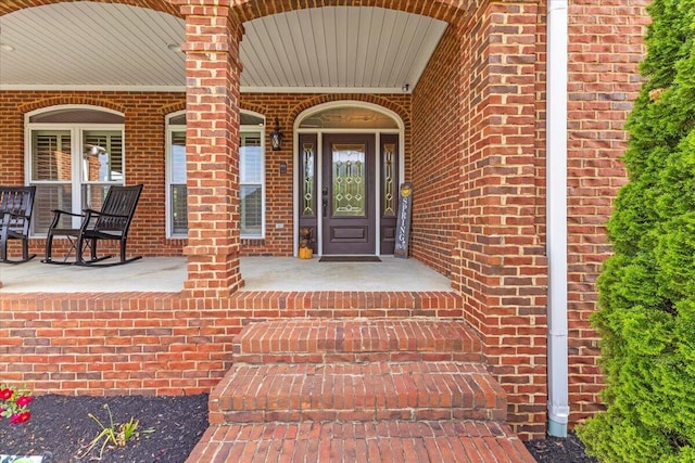 419 Colonial St, Jefferson City, TN 37760 - property entrance featuring brick siding and covered porch