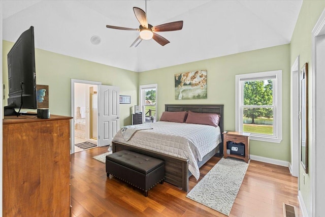 419 Colonial St, Jefferson City, TN 37760 - bedroom with multiple windows, wood finished floors, high vaulted ceiling, baseboards, and a ceiling fan