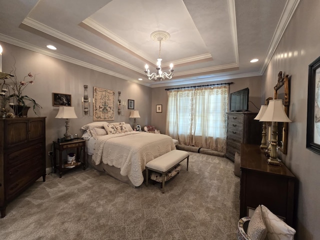 carpeted bedroom with an inviting chandelier, ornamental molding, and a tray ceiling