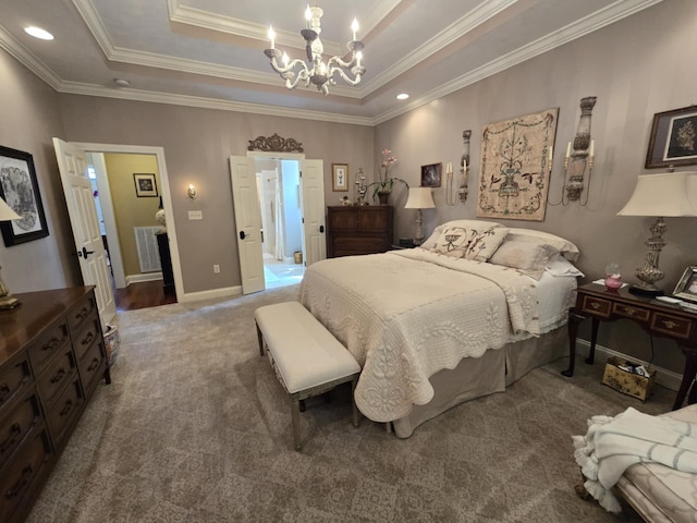 carpeted bedroom featuring an inviting chandelier, baseboards, crown molding, and a tray ceiling