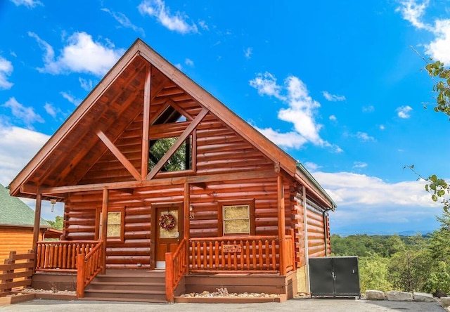 view of front of property featuring covered porch