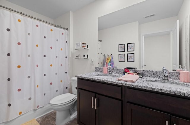 525 Cliff St, Morristown, TN 37814 - full bath with double vanity, toilet, and tile patterned floors