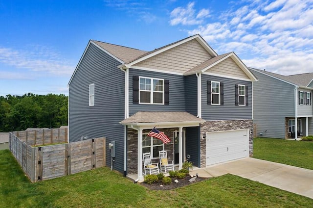 525 Cliff St, Morristown, TN 37814 - view of front of house featuring driveway, a garage, stone siding, and a porch