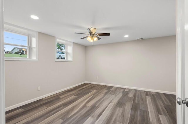 empty room featuring dark hardwood / wood-style flooring