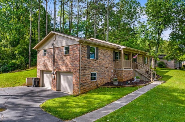 4061 Julian Ave, Morristown, TN 37814 - view of front of home with driveway, a garage, a front lawn, and brick siding