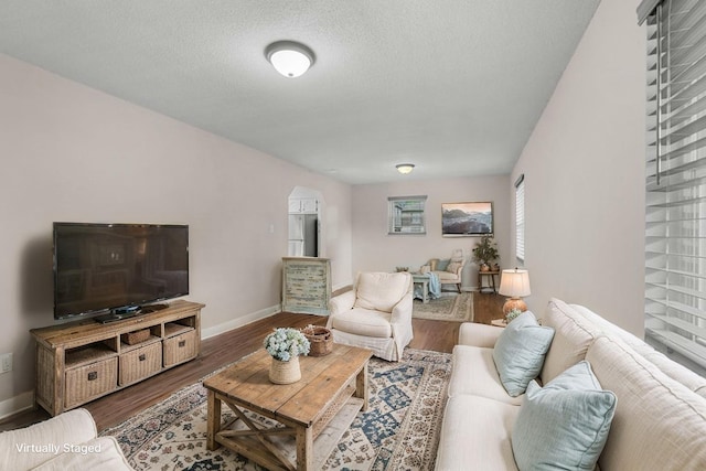 4061 Julian Ave, Morristown, TN 37814 - living room featuring baseboards, wood finished floors, and a textured ceiling