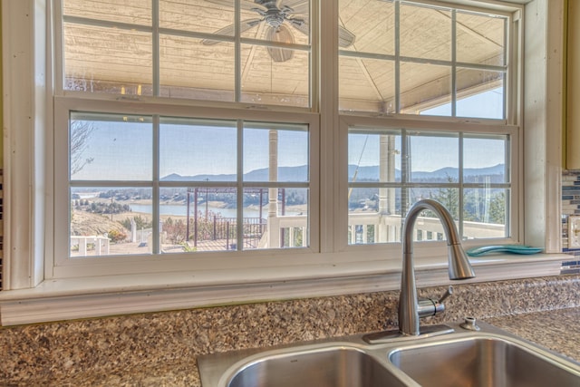 details featuring a sink and a mountain view