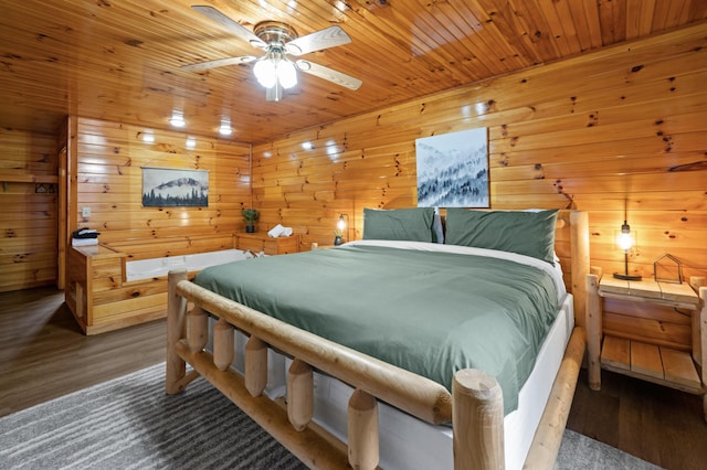 bedroom with hardwood / wood-style floors, wood ceiling, and wood walls