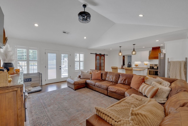 113 Cheshire Ct, Jefferson City, TN 37760 - living room with vaulted ceiling, recessed lighting, french doors, and light wood-style flooring