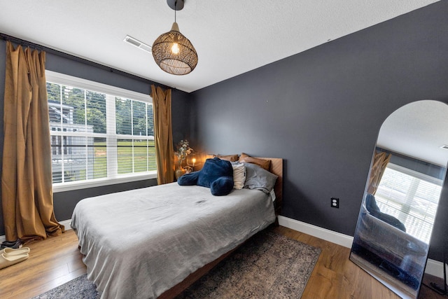 113 Cheshire Ct, Jefferson City, TN 37760 - bedroom featuring wood finished floors, baseboards, and arched walkways