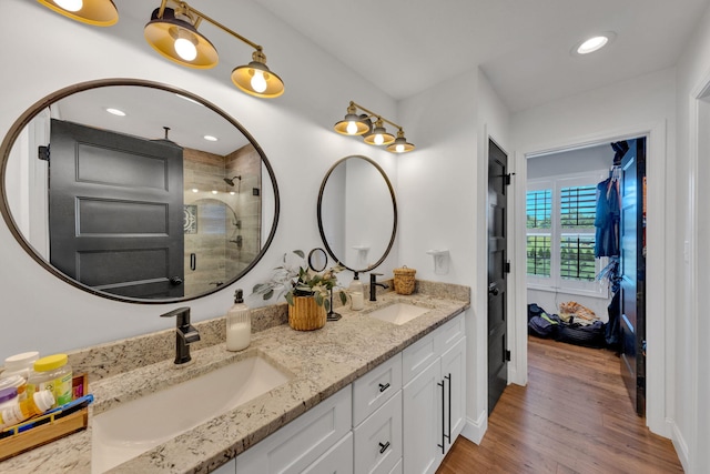 113 Cheshire Ct, Jefferson City, TN 37760 - bathroom featuring a stall shower, double vanity, wood finished floors, and recessed lighting