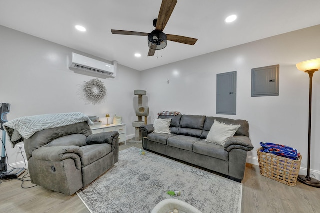 113 Cheshire Ct, Jefferson City, TN 37760 - living area featuring electric panel, a wall unit AC, a ceiling fan, light wood-type flooring, and recessed lighting