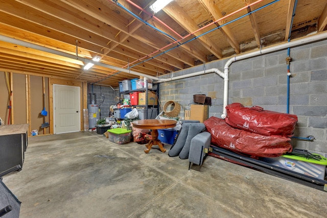 113 Cheshire Ct, Jefferson City, TN 37760 - unfinished basement featuring electric water heater and concrete block wall