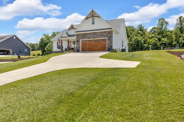 113 Cheshire Ct, Jefferson City, TN 37760 - craftsman-style house with a front lawn, cooling unit, stone siding, and driveway