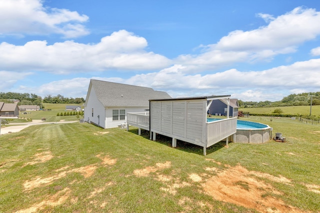 113 Cheshire Ct, Jefferson City, TN 37760 - rear view of property with an outdoor pool and a lawn