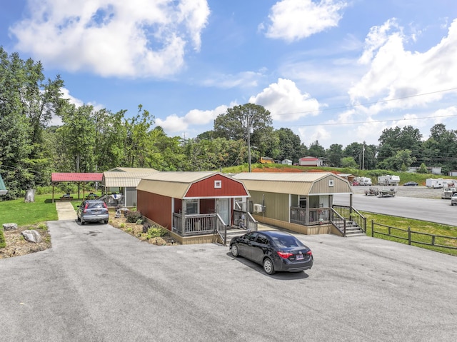 104-116 Circle Rd, Newport, TN 37821 - view of front of home featuring a detached carport and a porch