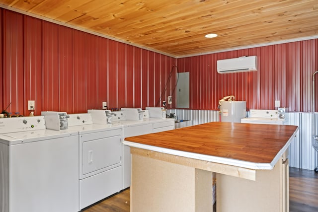 104-116 Circle Rd, Newport, TN 37821 - community laundry featuring washer and dryer, an AC wall unit, water heater, wooden ceiling, and electric panel