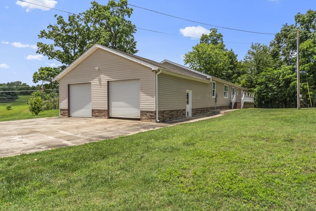 104-116 Circle Rd, Newport, TN 37821 - view of home's exterior with a yard, stone siding, and a garage