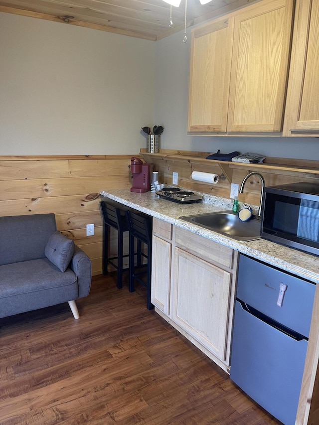 104-116 Circle Rd, Newport, TN 37821 - kitchen with stainless steel microwave, light brown cabinets, and dark wood-style floors