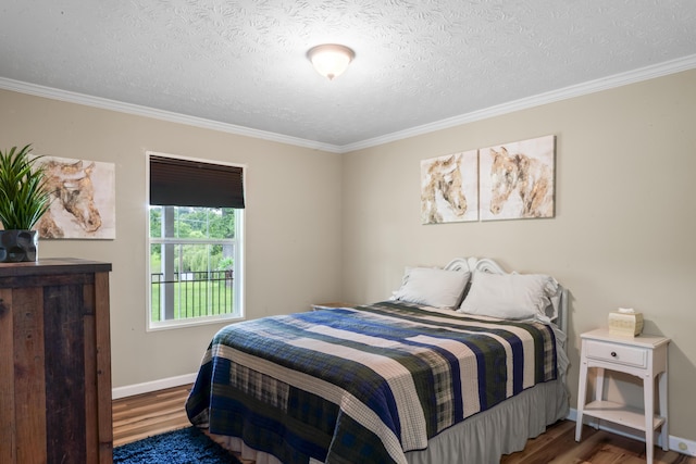 104-116 Circle Rd, Newport, TN 37821 - bedroom with wood finished floors, ornamental molding, and a textured ceiling