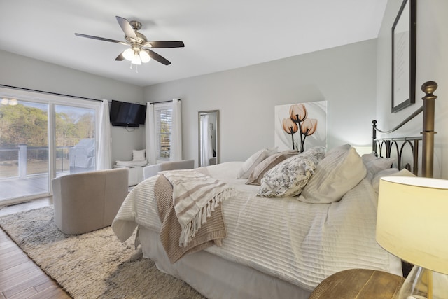 340 Back Nine Dr, Baneberry, TN 37890 - bedroom with access to outside, wood finished floors, and ceiling fan