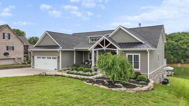 340 Back Nine Dr, Baneberry, TN 37890 - craftsman-style house featuring a standing seam roof, driveway, a front yard, a garage, and roof with shingles