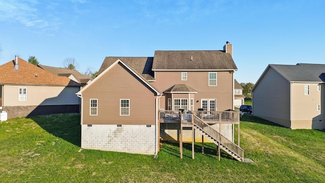 9357 Gabrielle Rd, Strawberry Plains, TN 37871 - rear view of property featuring a deck, stairway, a chimney, a lawn, and crawl space