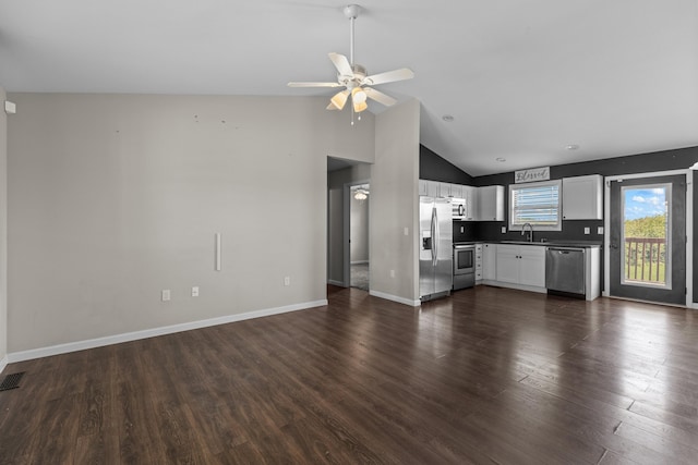 6625 Lainey Jane Ct, Whitesburg, TN 37891 - unfurnished living room featuring a sink, ceiling fan, baseboards, dark wood finished floors, and high vaulted ceiling