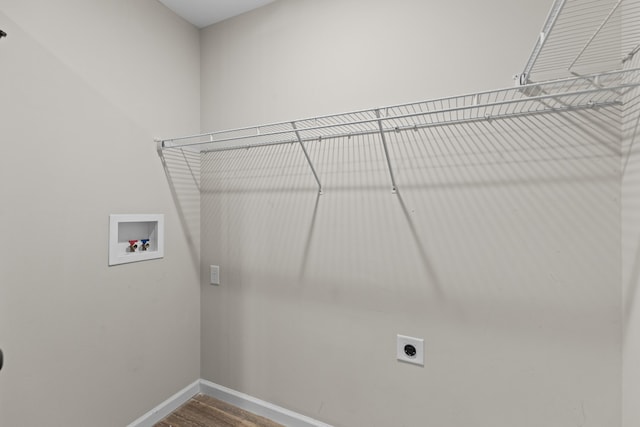 6625 Lainey Jane Ct, Whitesburg, TN 37891 - washroom featuring washer hookup, baseboards, hookup for an electric dryer, and wood finished floors